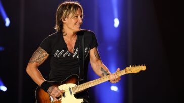 Why Keith Urban Continues to Play His Worn Telecaster Named Clarence]