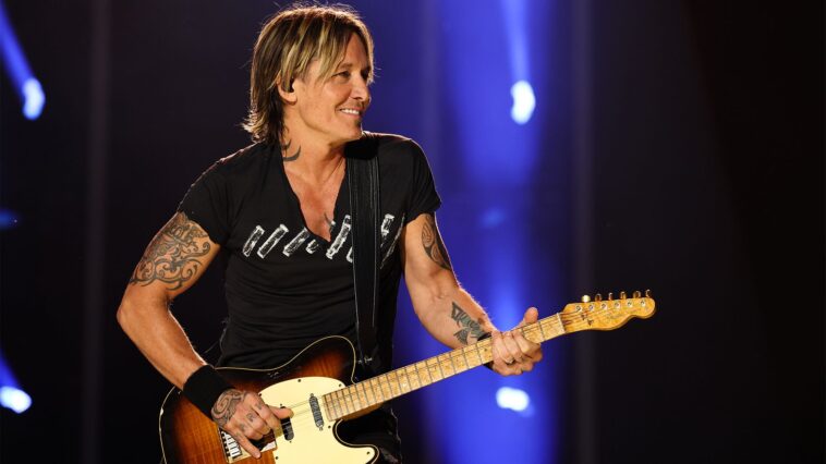 Why Keith Urban Continues to Play His Worn Telecaster Named Clarence]