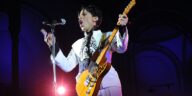 "Why Prince Believed It's Essential for Kids to Truly Learn Guitar: The Challenges of the Instrument and His Stance on Guitar Hero"]