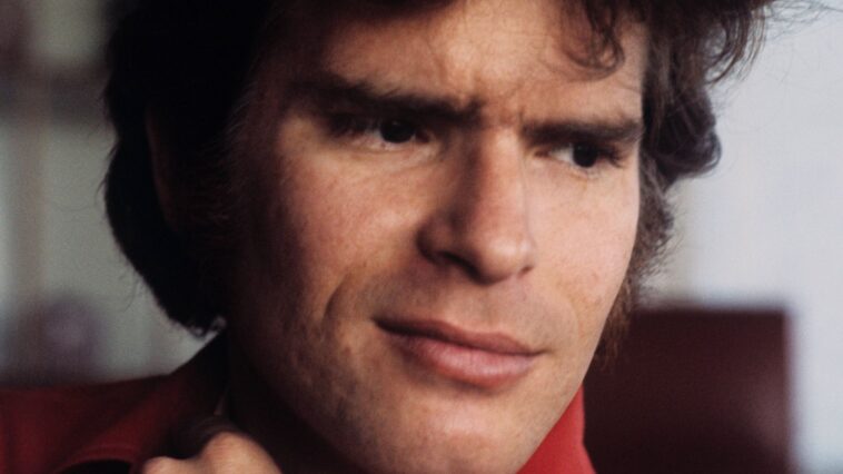 "Without my songwriting or another lead vocalist, I doubt we would have achieved success; we would likely still be performing at local clubs. This is the tale of a rock classic that has now surpassed two billion streams."]