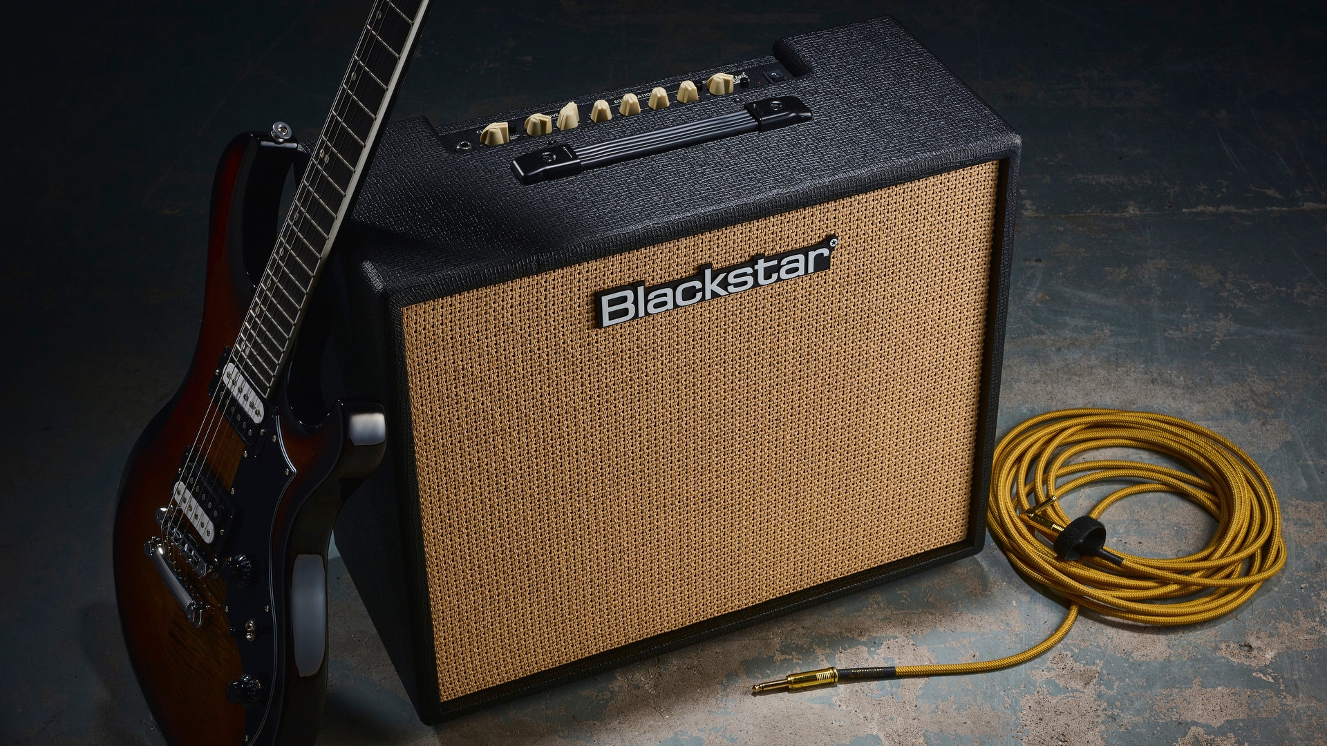 A Blackstar Debut practice amp with a guitar and guitar cable