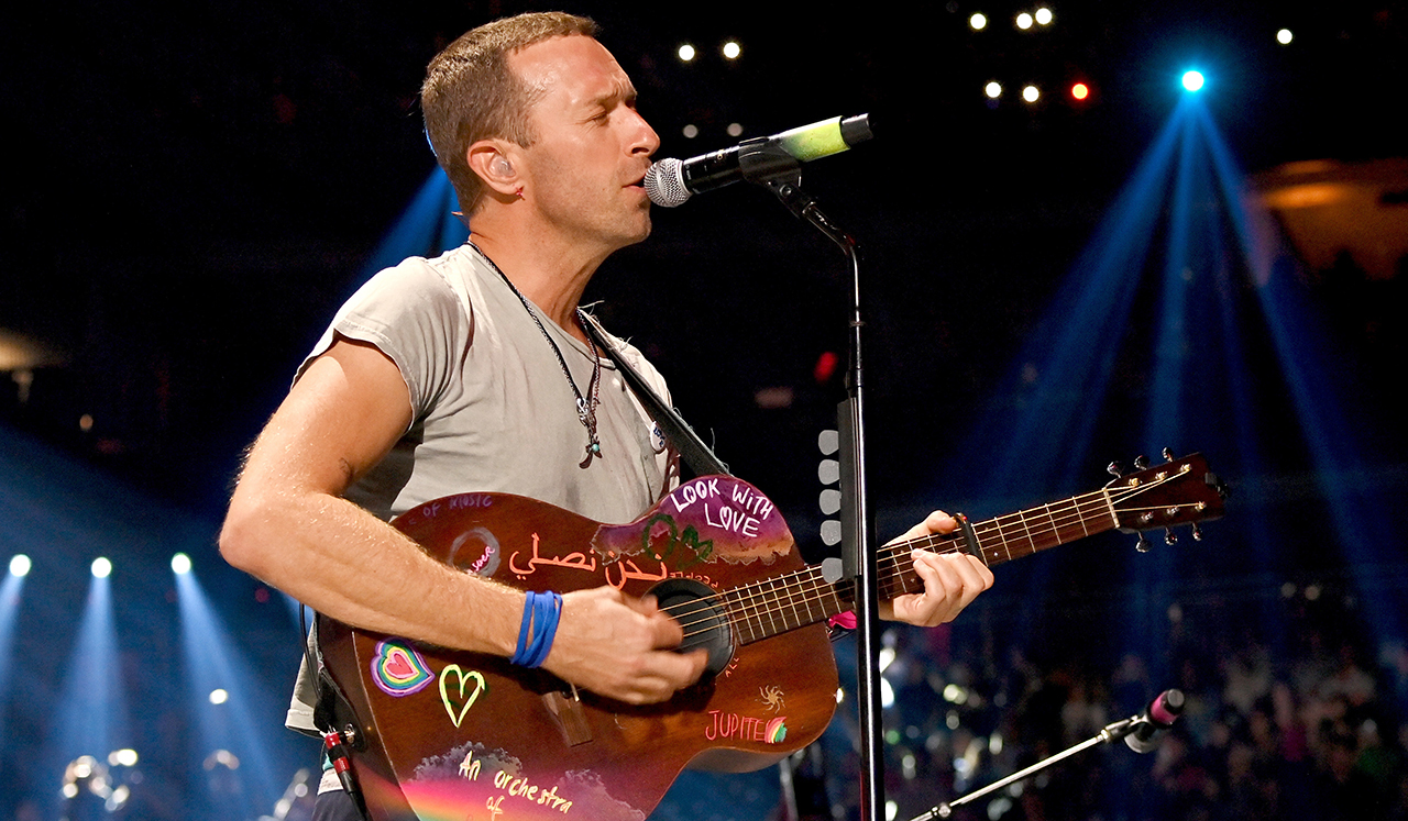 Chris Martin of Coldplay performs onstage at the 2024 iHeartRadio Music Festival at T-Mobile Arena on September 21, 2024 in Las Vegas, Nevada.