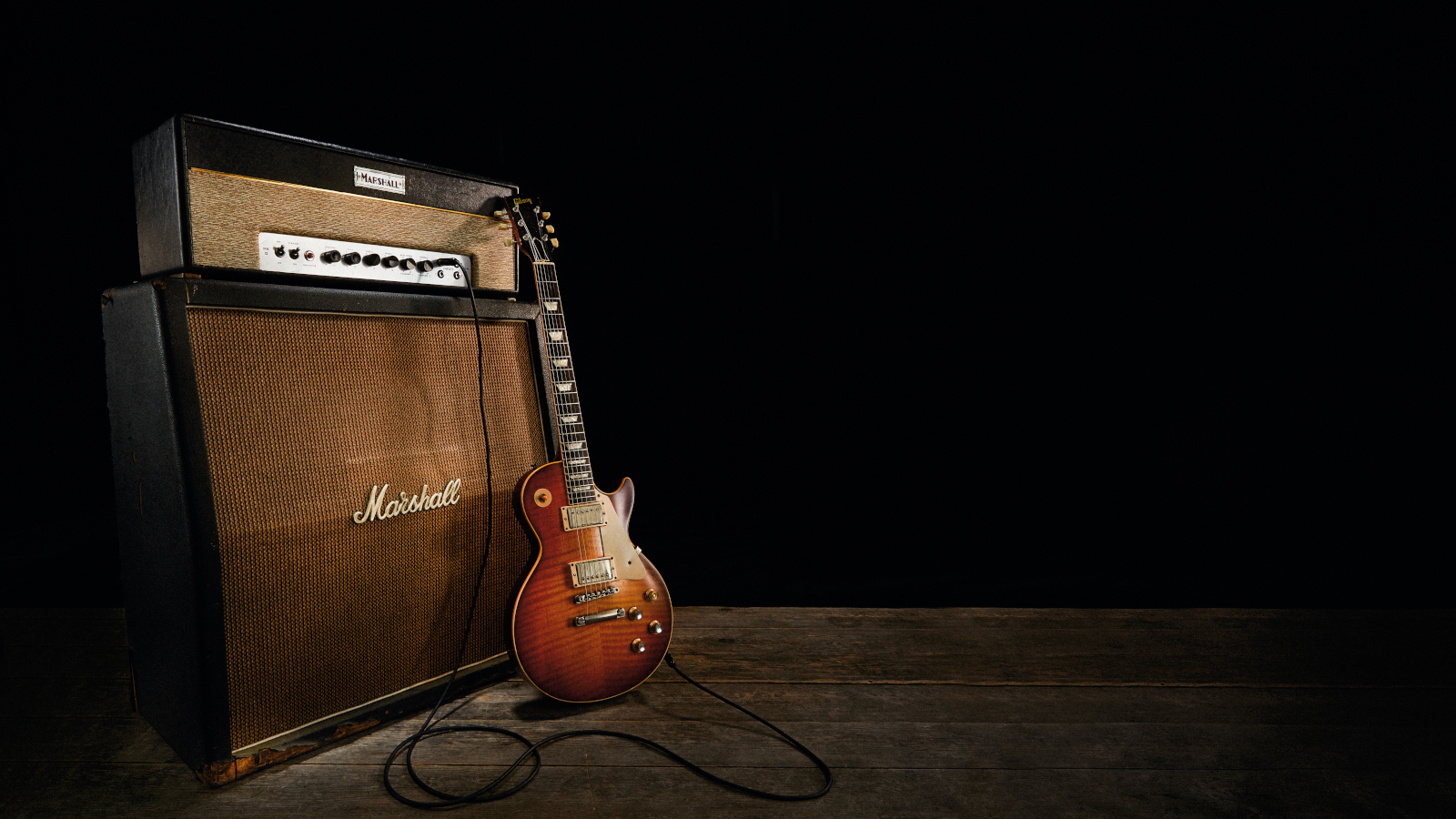 1964 Marshall JTM 45 MKII amp head atop 1968 Marshall 1960s 4x12 G12M Celestion speaker cabinet with Gibson Les Paul Standard
