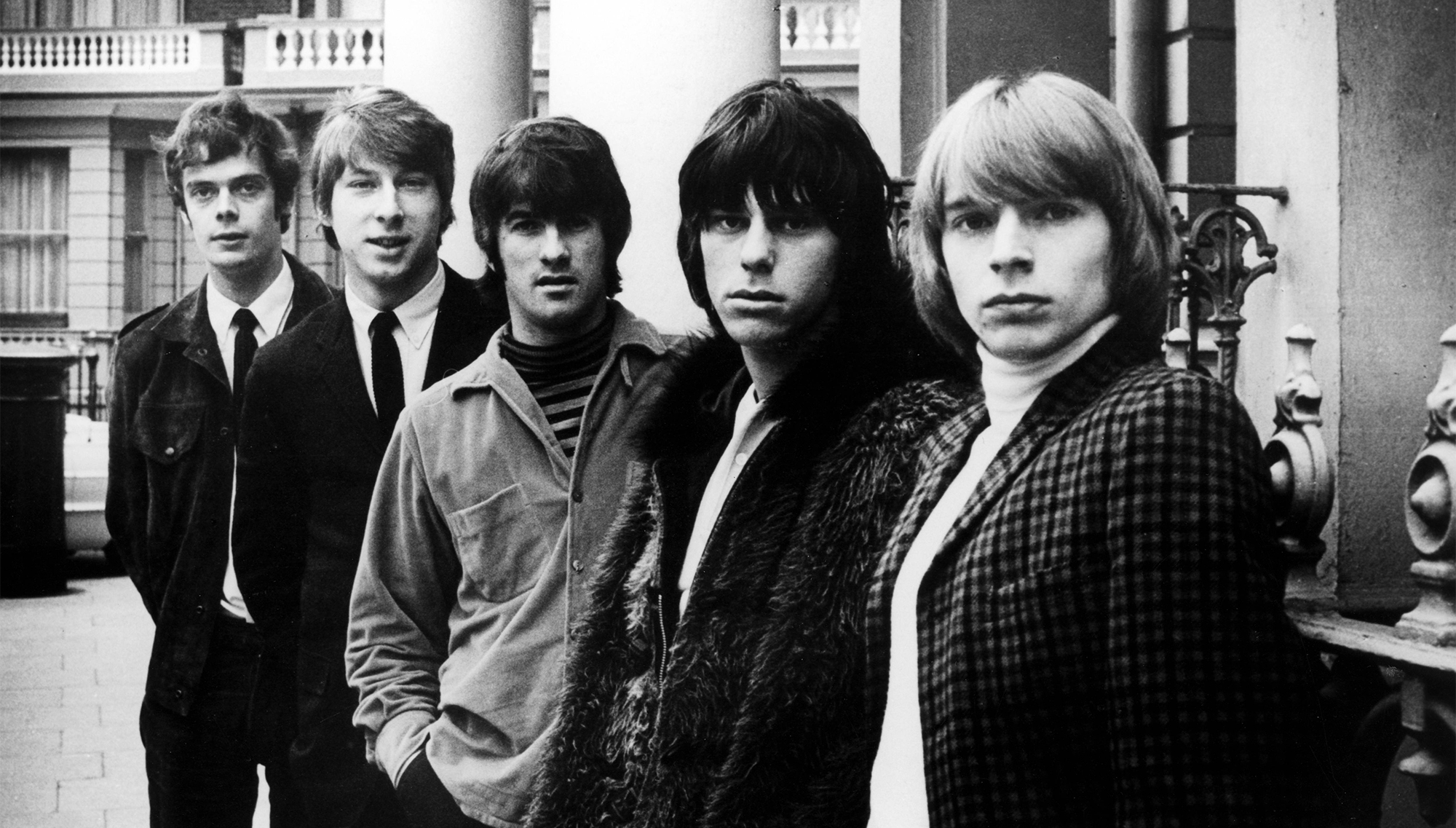 English group The Yardbirds, featuring from left, Paul Samwell-Smith, Chris Dreja, Jim McCarty, Jeff Beck and Keith Relf, posed together on a London street in 1965.
