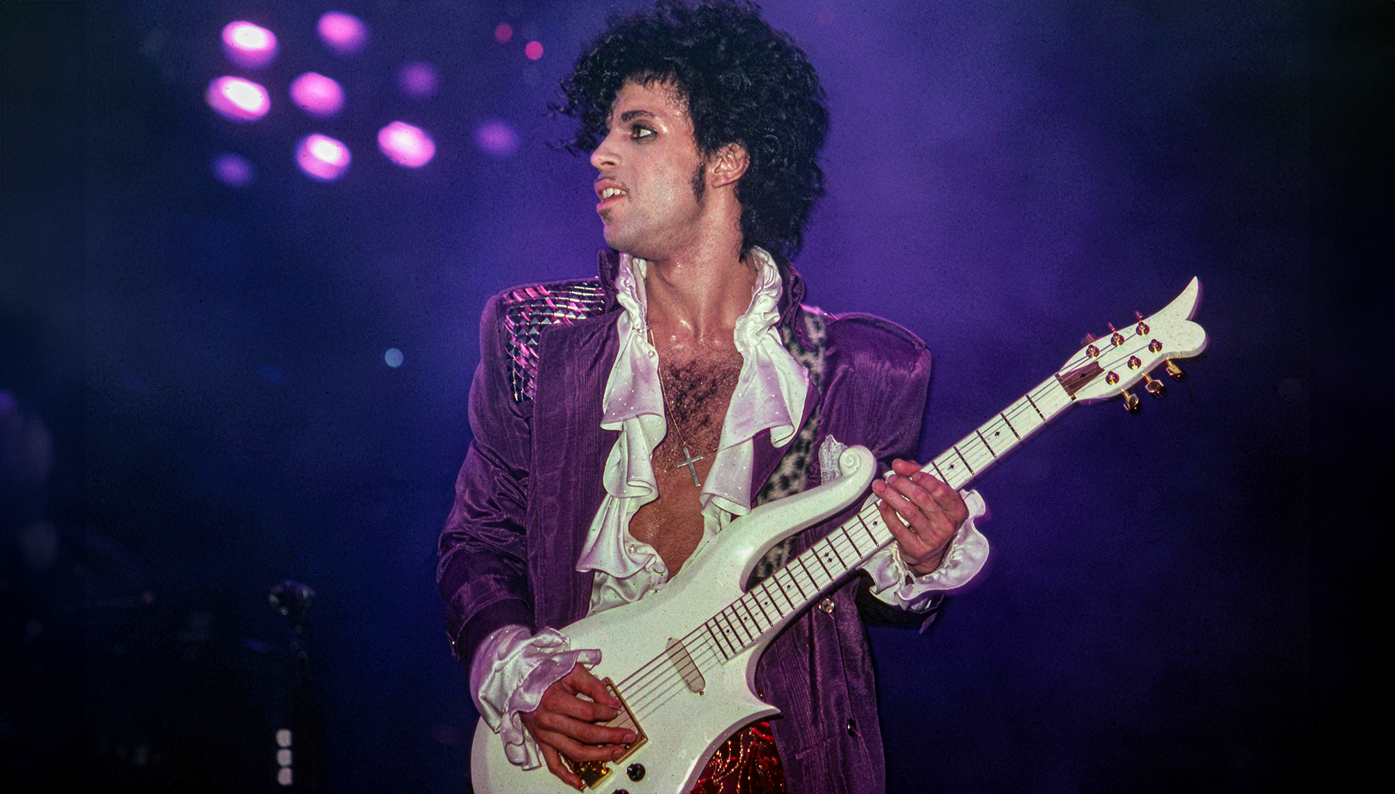 American singer, songwriter, musician, record producer, dancer, actor, and filmmaker Prince (1958-2016) performs onstage during the 1984 Purple Rain Tour on November 4, 1984, at the Joe Louis Arena in Detroit, Michigan.