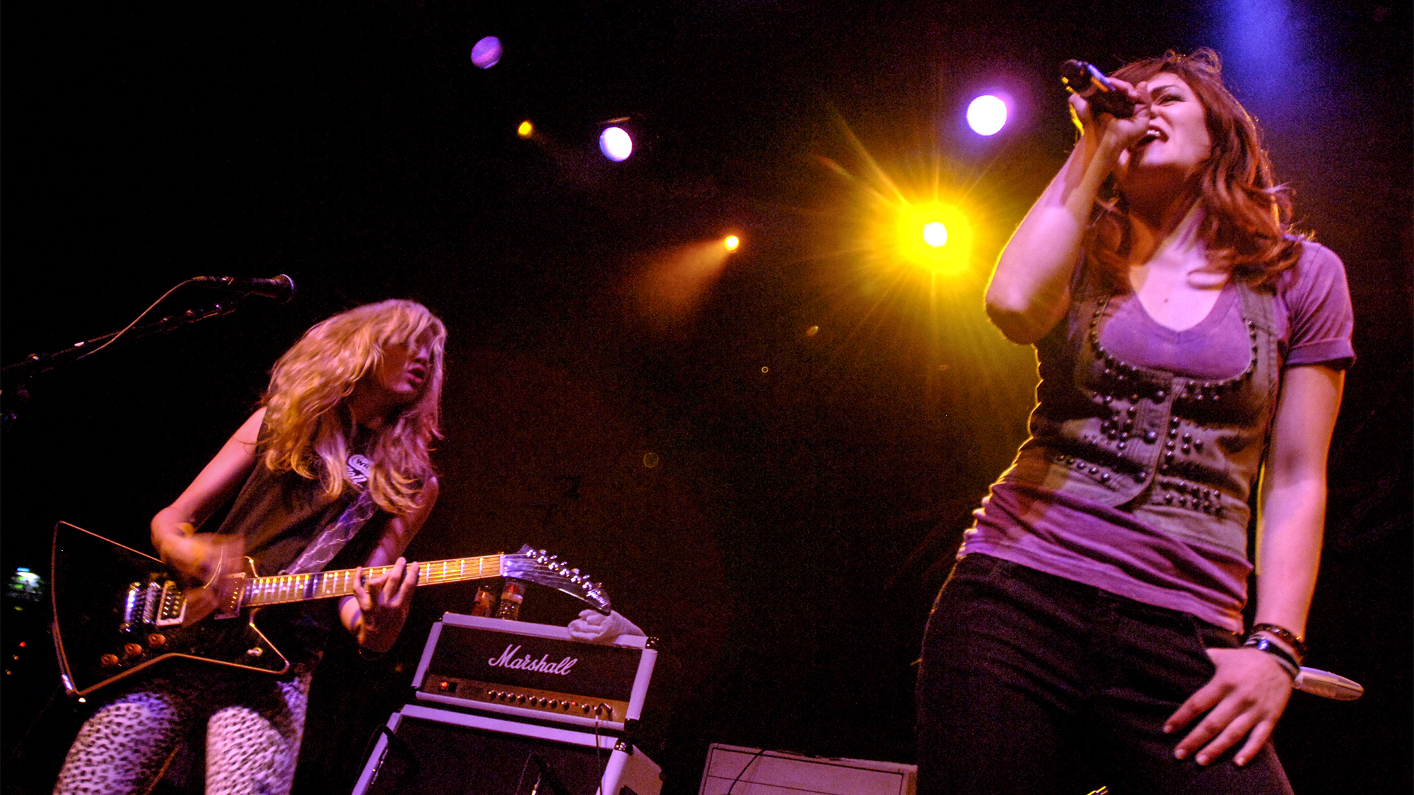Allison Robertson (L) and Brett Anderson of The Donnas perform in support of their "Bitchin'" release at the Fillmore on February 20, 2008 in San Francisco, California.