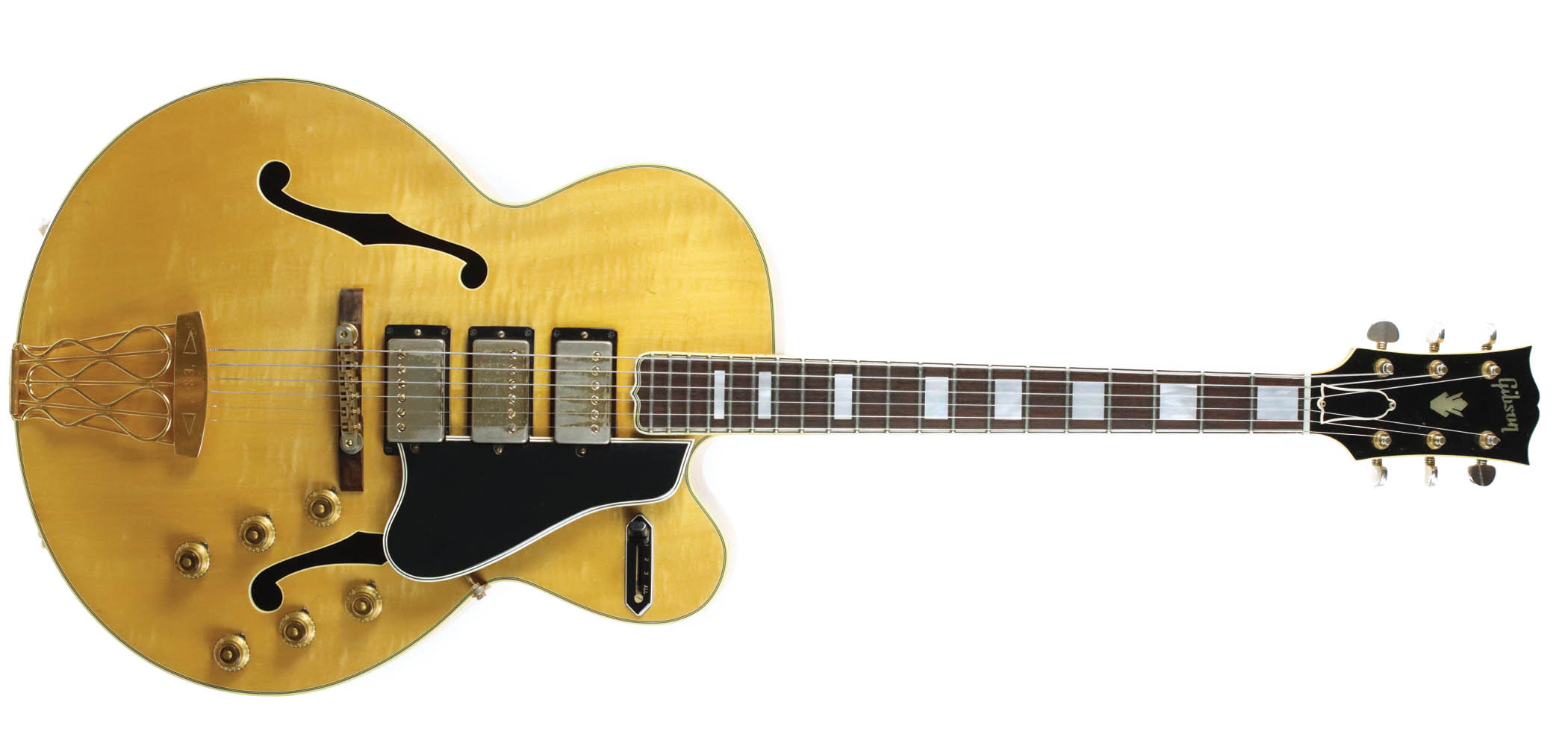 The Gibson ES-5 was essentially an ES-350 with a third pickup, and Patent Applied For humbuckers replaced the&nbsp;P-90s in 1957
