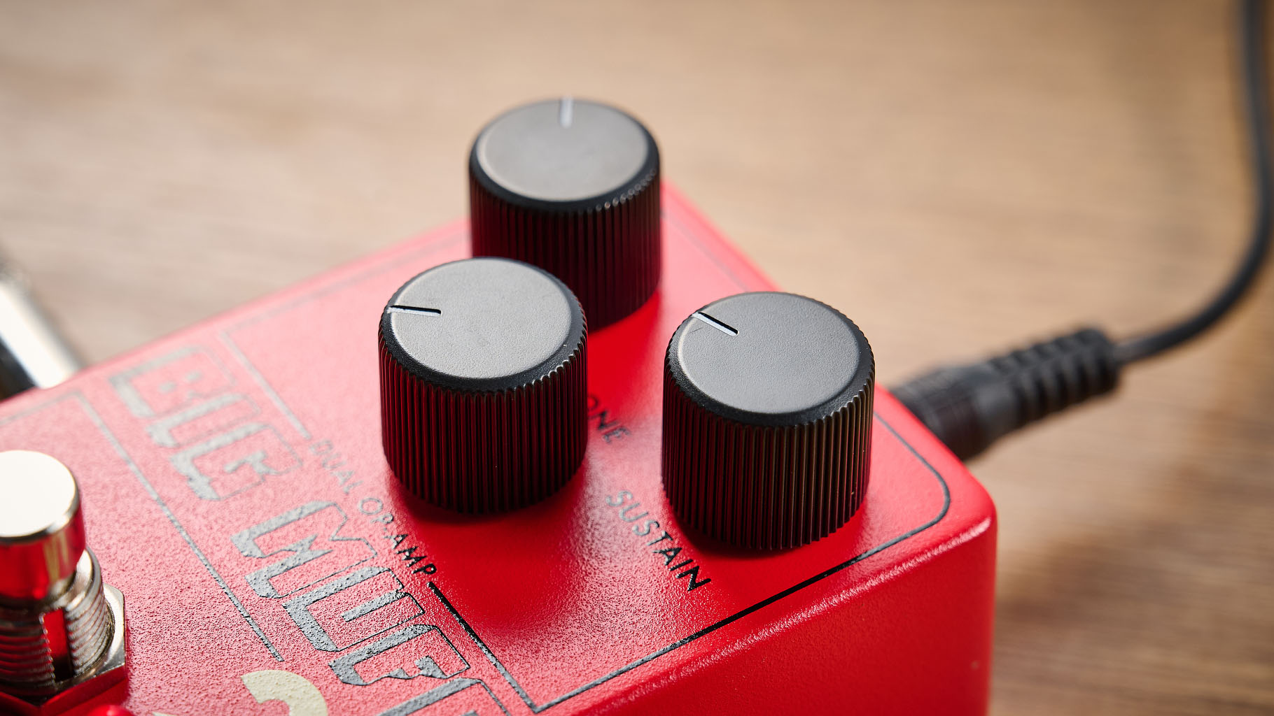 Electro-Harmonix Big Muff Pi 2 Dual Op-Amp Fuzz is built from a lost schematic that's 50 years old but the form factor is familiar for contemporary EHX stompboxes, a three-knob fuzz, red enclosure.