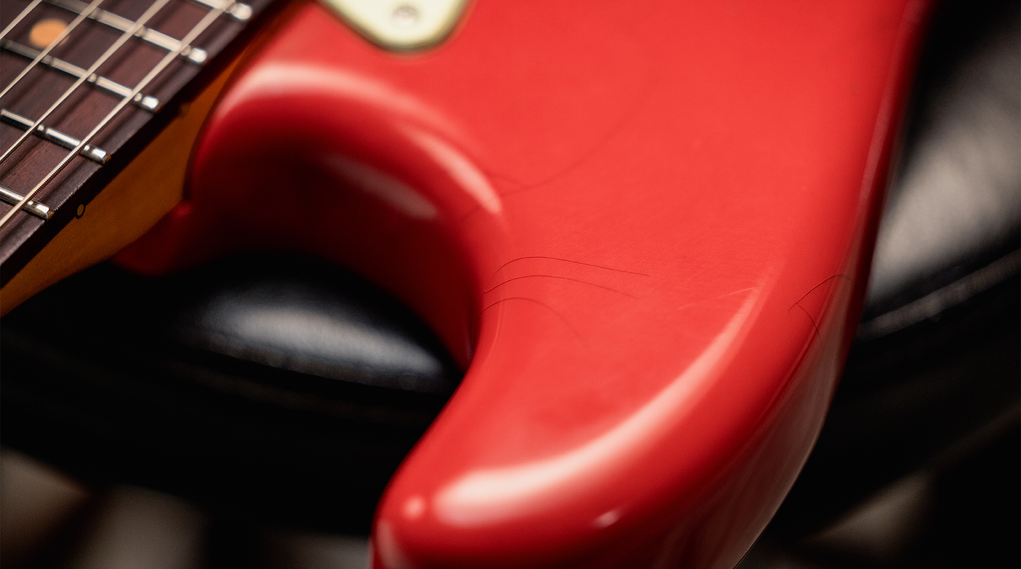 A photo of the Fender American Ultra Luxe Vintage &rsquo;60s Stratocaster HSS in Fiesta Red