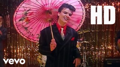 “I said to the band, ‘The good news is that we’ve got a hit, but the bad news is that you’re not on it!'”: The surprising story of the Blow Monkeys’ AIDS crisis-inspired Digging Your Scene, with new insight from its writer