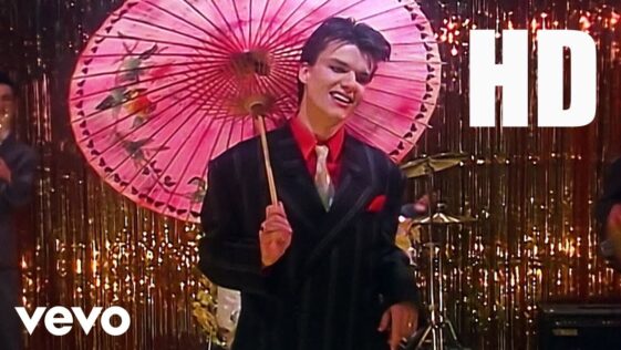 “I said to the band, ‘The good news is that we’ve got a hit, but the bad news is that you’re not on it!'”: The surprising story of the Blow Monkeys’ AIDS crisis-inspired Digging Your Scene, with new insight from its writer