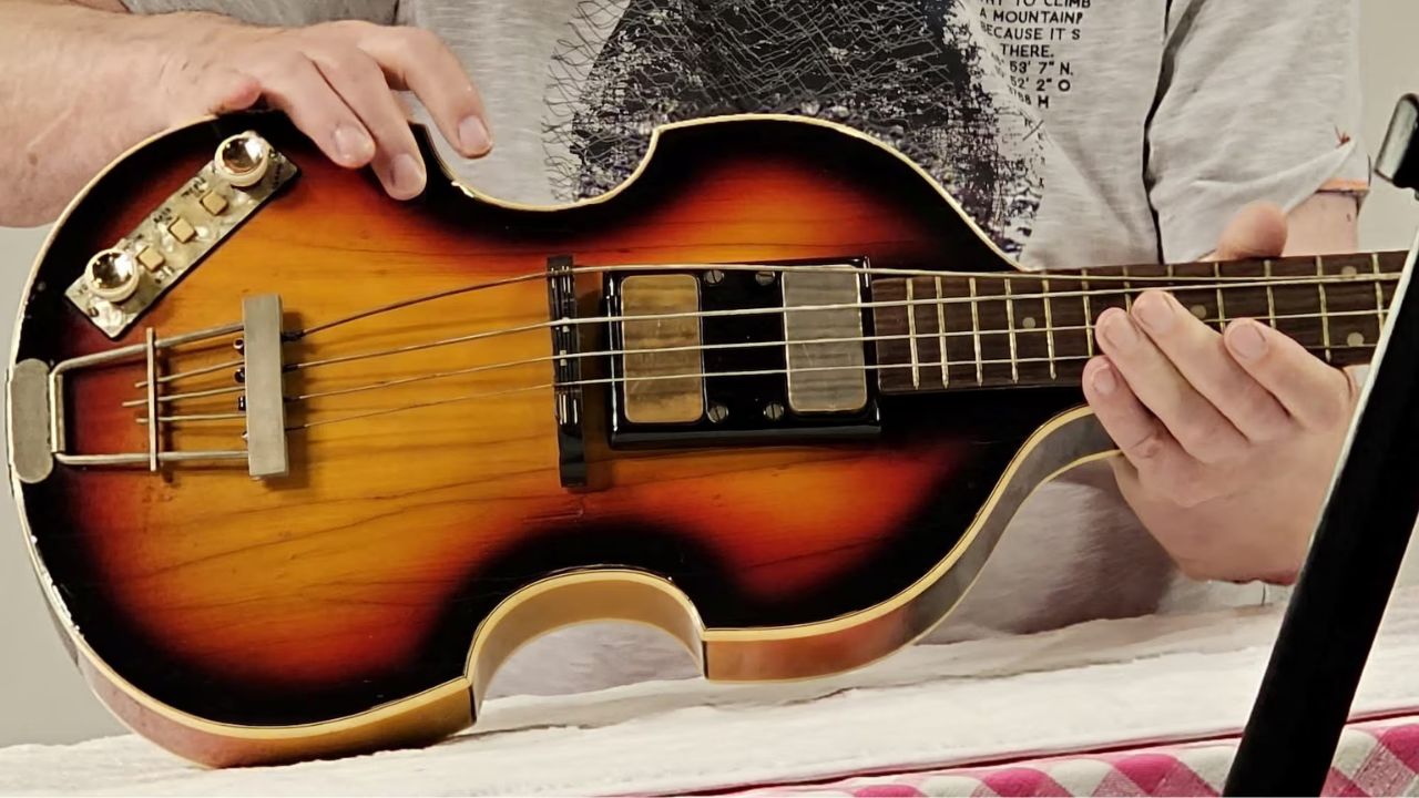 Nick Wass inspects Paul McCartney's missing Hofner 500/1 Violin Bass