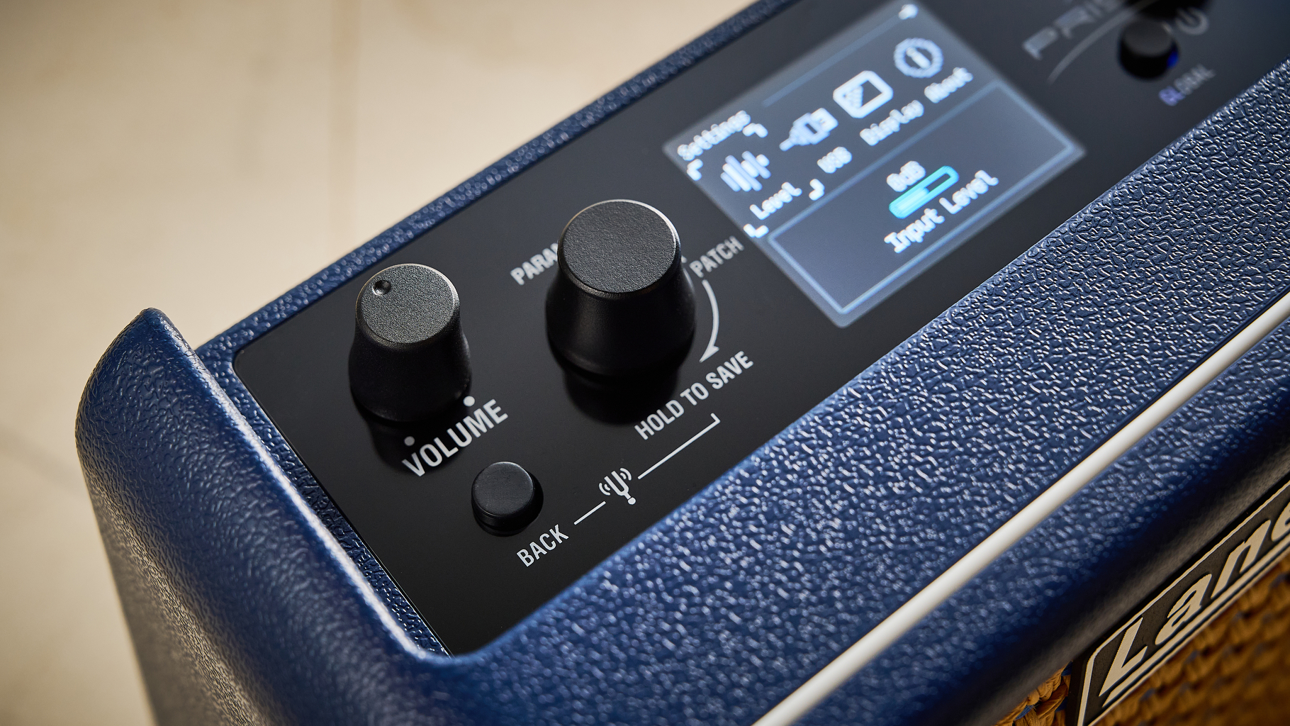 The volume and parameter encoders on the Laney Prism Mini guitar amp