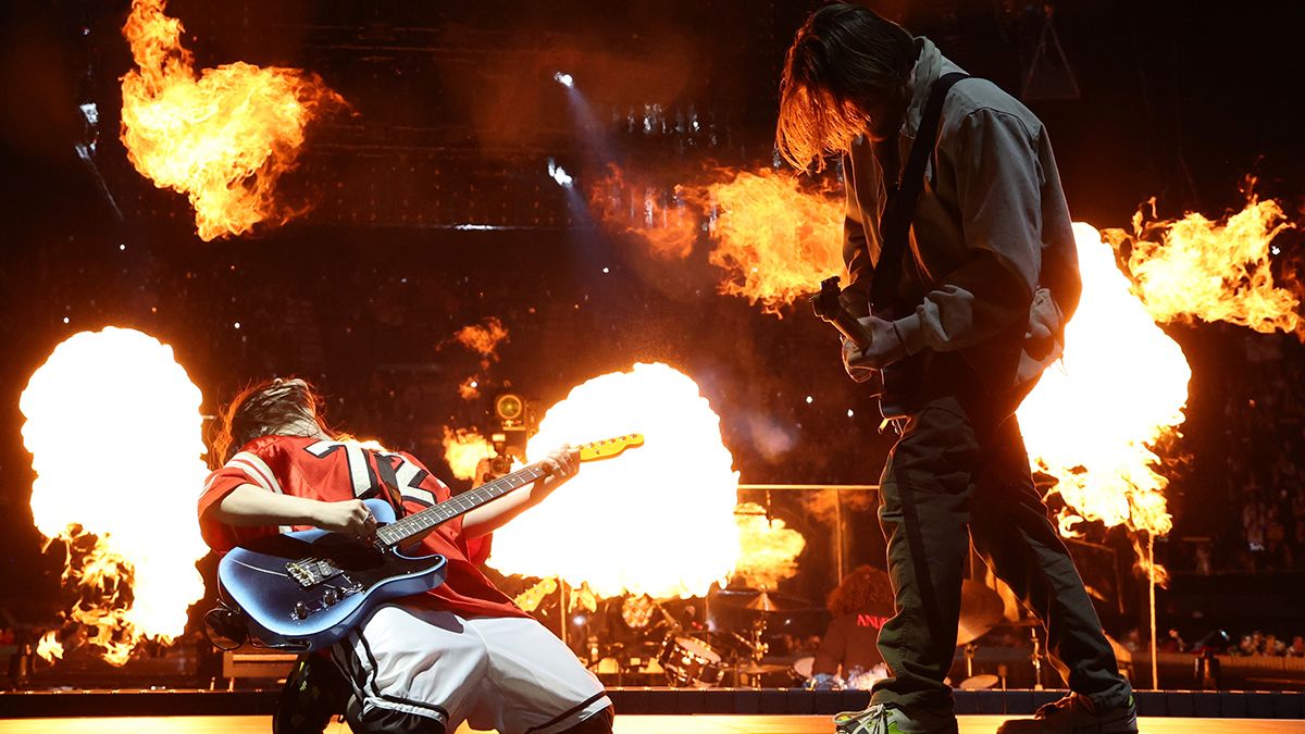 "Billie Eilish Reveals Why Her Brother Finneas Became a 'Rapunzel' Figure in Her Tour, Calling Her Latest Grammy Win for 'Wildflower' a 'Miracle' Amidst Rumors of a Falling-Out"]