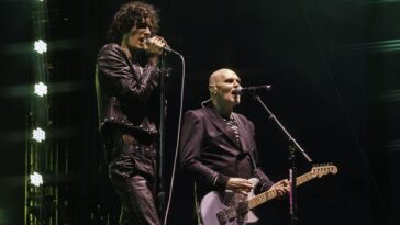 "Can I bring some rock legends on stage right now?" Billy Corgan experiences a mic issue during his Coachella debut with Sombr while performing a classic from Smashing Pumpkins.]