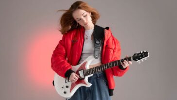 "Designed Specifically for Women: A Review of the Venus Revolution and Revolution Elite Dark Roast Electric Guitars."]