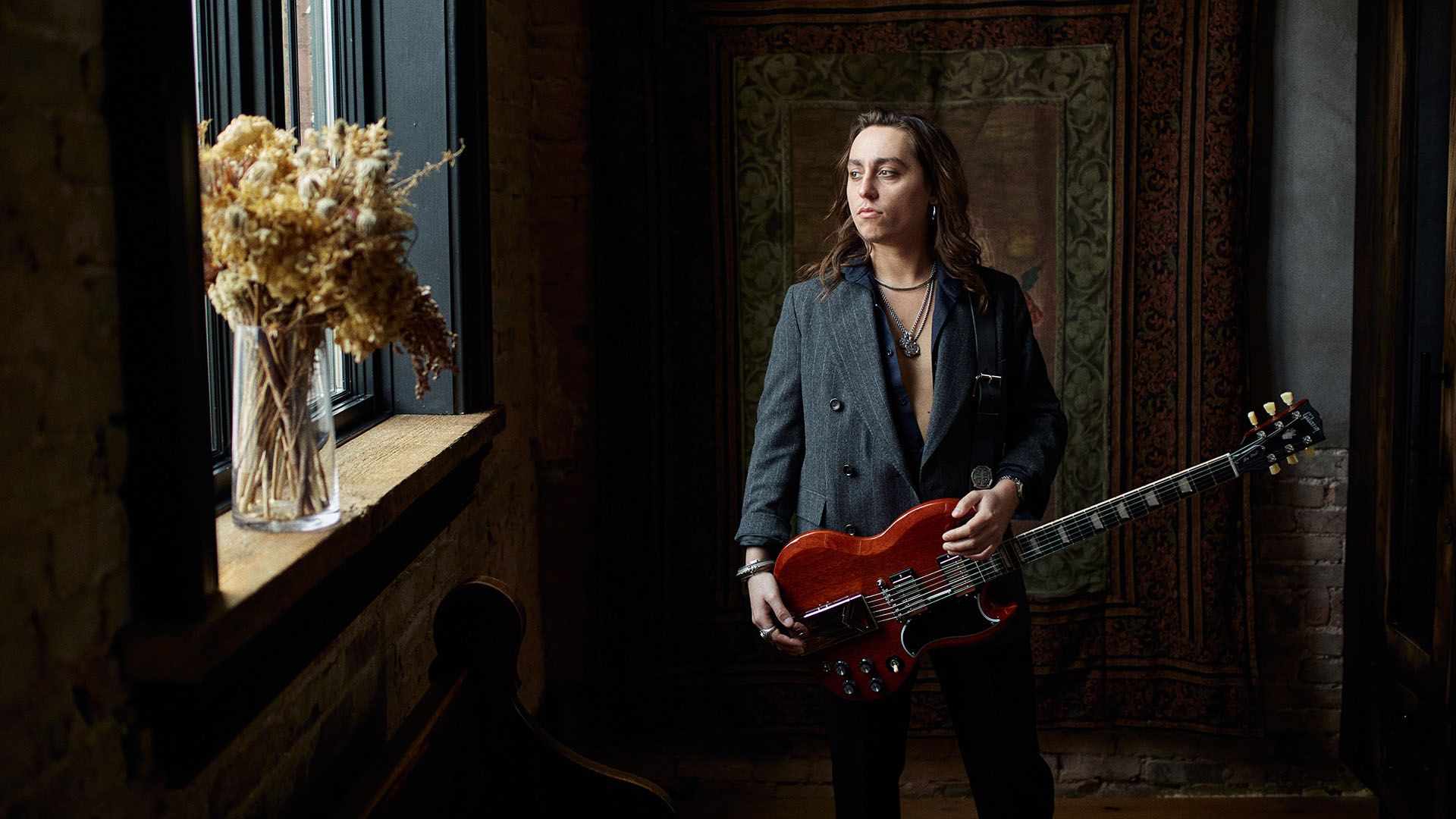 Gibson Introduces Jake Kiszka's Signature SG Model with Greta Van Fleet.]