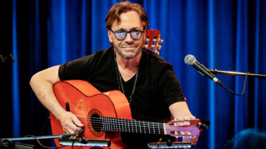 Al Di Meola says an acid trip landed him the gig of a lifetime