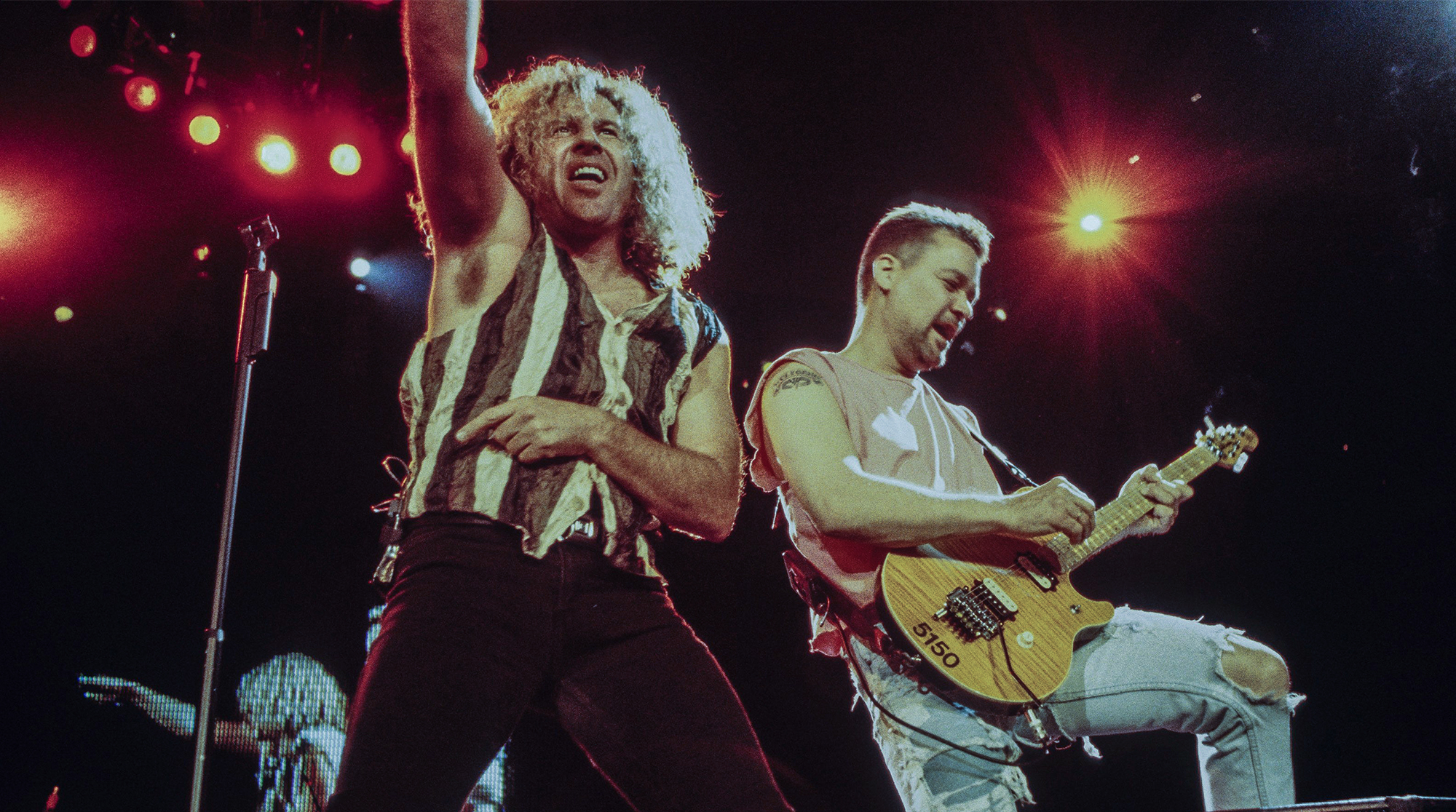 Van Halen vocalist Sammy Hagar and guitarist Eddie Van Halen perform at the Target Center in Minneapolis, Minnesota on July 30, 1995.