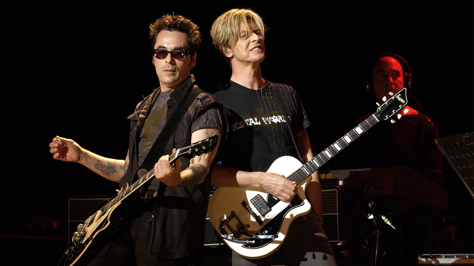 "I Was Terrified: Earl Slick Reflects on His Debut Performance with David Bowie"]