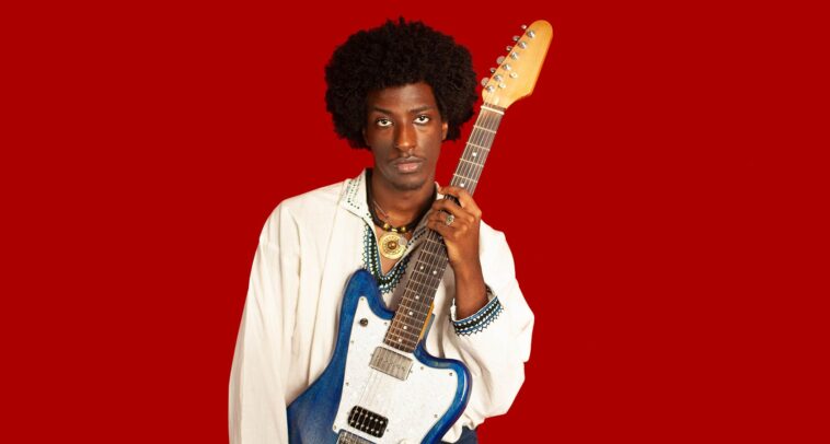 Introducing Amani Burnham, the emerging blues-rock sensation merging fingerstyle technique with Stevie Ray Vaughan's signature sound.]