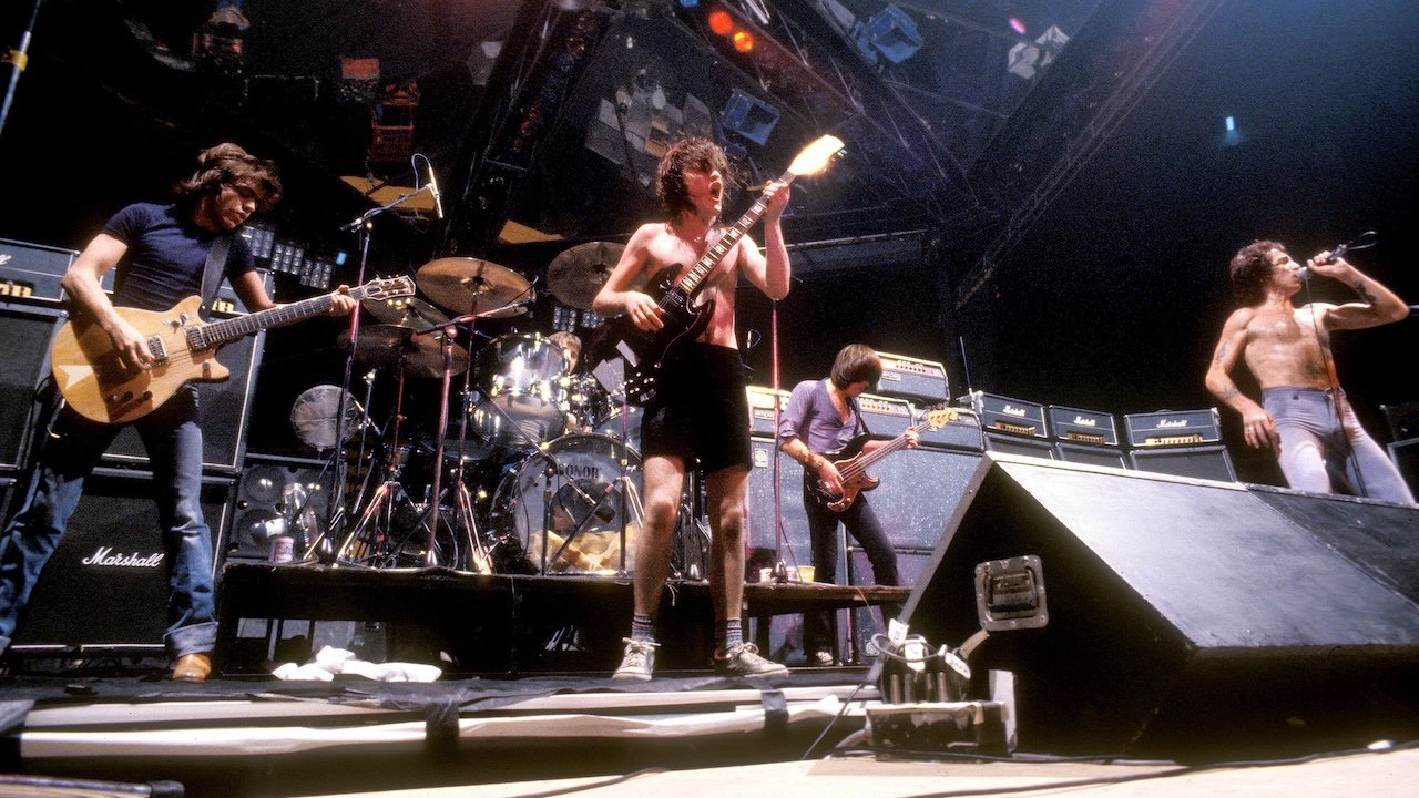 October 1978: AC/DC performs at the Orpheum Theater, in Boston, Massachusetts, October 9, 1978 Malcolm Young, Phil Rudd, Angus Young, Cliff Williams, Bon Scott