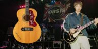 Noel Gallagher’s autographed Wonderwall EJ-200 fetches $96,000 at auction.]