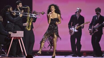 "Olivia Dean reveals that her biggest hit 'wasn’t meant to be a single' and shares how playing it during rehearsals changed her mind, plus names the Motown icon who inspires her."]