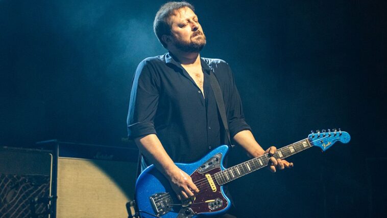 Richard Oakes shares his experiences of joining Suede as a young teen.]