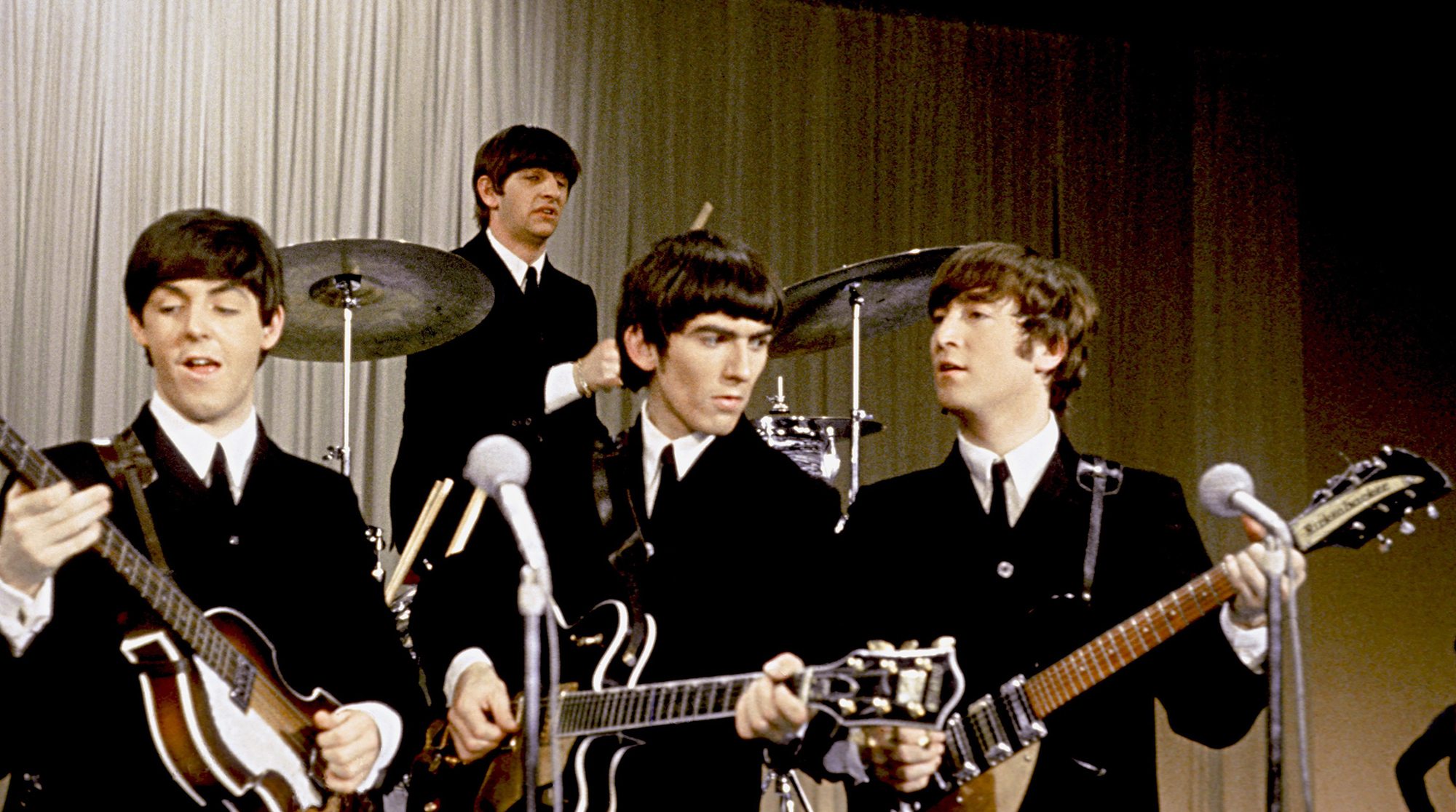 The Beatles' perform onstage in a still from their movie 'A Hard Day's Night' which was released in 1964. (L-R) Paul McCartney, Ringo Starr, George Harrison and John Lennon.