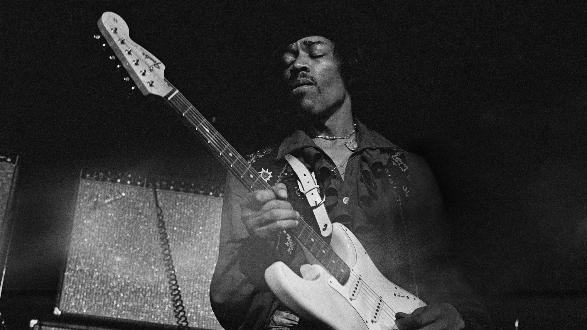 Jimi Hendrix playing a Fender Stratocaster guitar, while performing live onstage, 1968,
