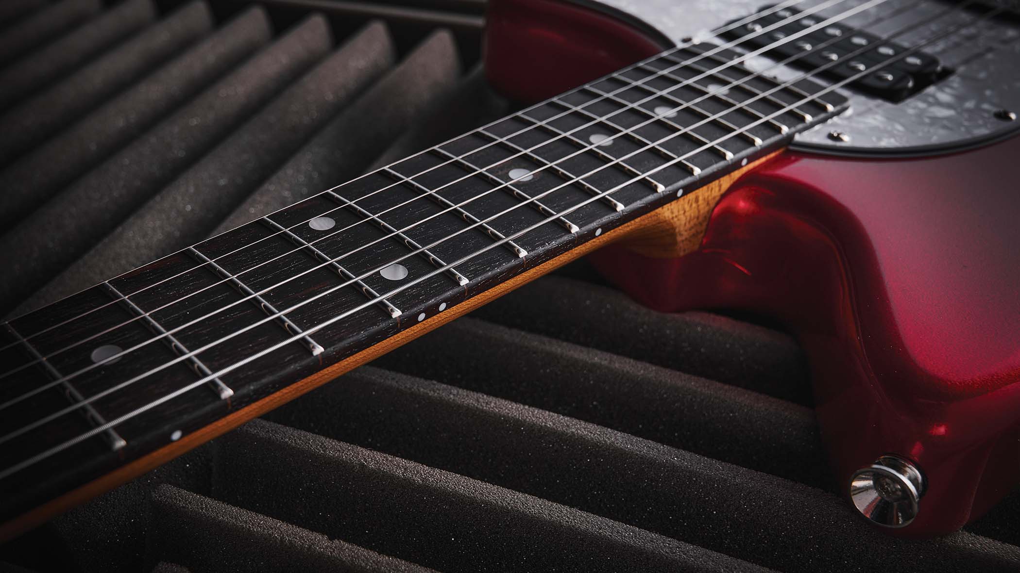 The red hardtail pickup-swapping offset is made in China, and comes with three Seymour Duncan and Guitar-X pickups included