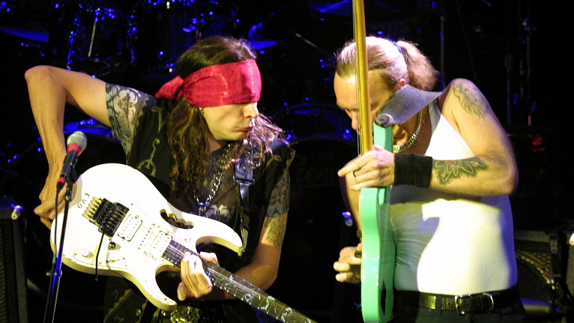 Steve Vai and bassist Billy Sheehan jam on the G3 tour at the House of Blues inside the Mandalay Bay Resort &amp; Casino June 24, 2001 in Las Vegas, Nevada.