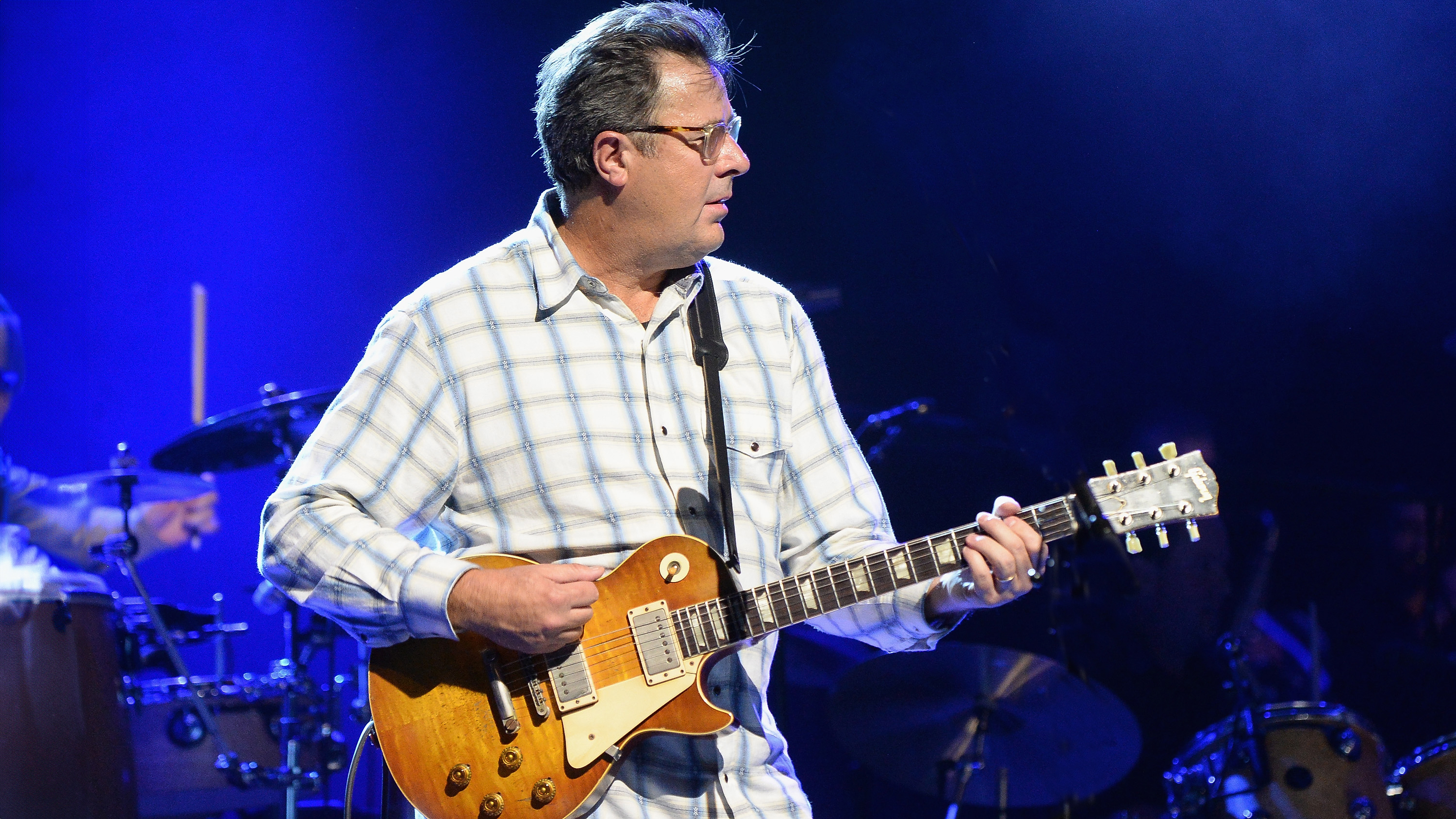 NASHVILLE, TN - OCTOBER 29: Vince Gill performs with the Eagles during SiriusXM presents the Eagles in their first ever concert at the Grand Ole Opry House on October 29, 2017 in Nashville, Tennessee.