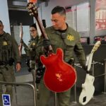 California police recover $60,000 worth of guitars taken from Guitar Center.]