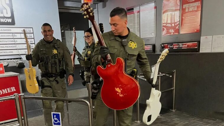 California police recover $60,000 worth of guitars taken from Guitar Center.]