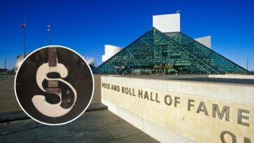 Cleveland rock legend pays a visit to his S-shaped guitar at the Rock and Roll Hall of Fame.]