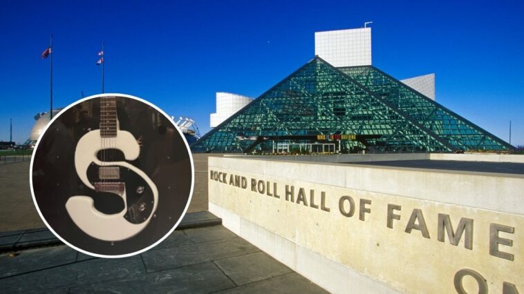 Cleveland rock legend pays a visit to his S-shaped guitar at the Rock and Roll Hall of Fame.]