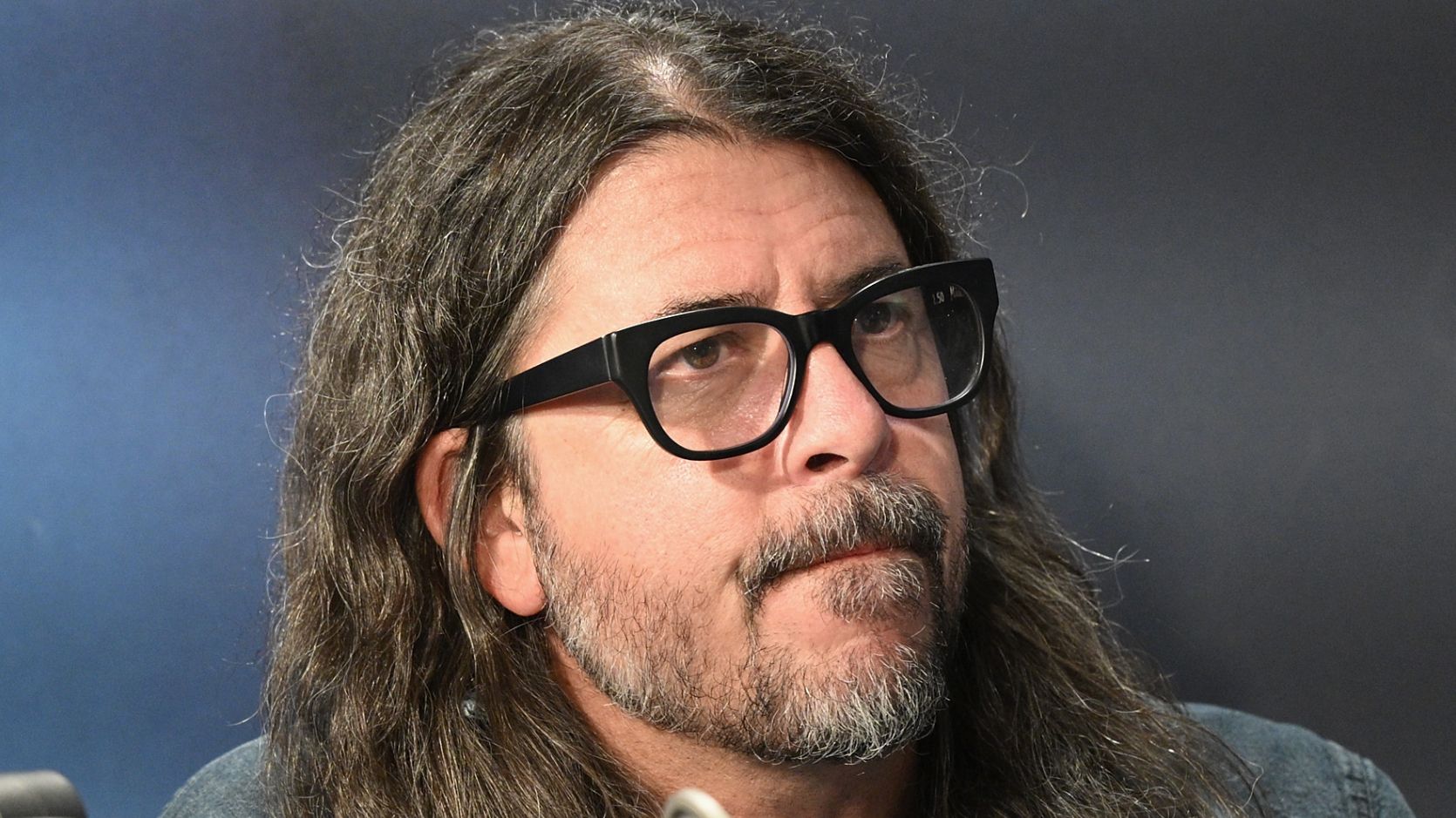 "Dave Grohl Shares How He Felt Watched by a Security Guard While Distributing CDRs of the New Foo Fighters Album in Southern California"]