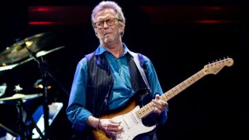 Eric Clapton credits Jeff Beck with helping him overcome a slump.]