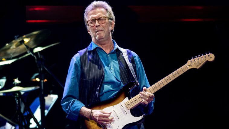 Eric Clapton credits Jeff Beck with helping him overcome a slump.]
