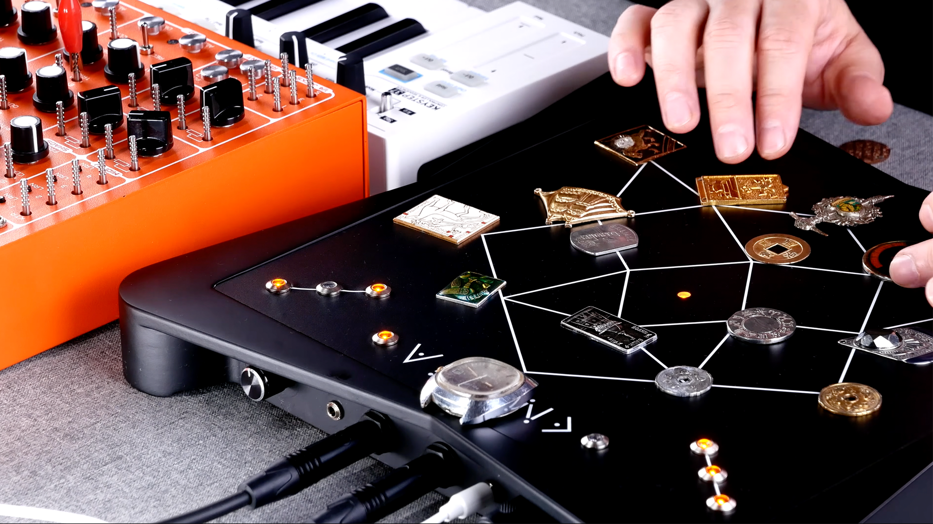 Have some spare change? It could be the key to your next electronic creation when you place it on Soma’s Enigma – the synth that responds to metal objects.]