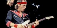 "It felt like entering a swimming pool while wearing heavy lead boots." Mark Knopfler reflects on his exhausting 10-hour session with Steely Dan that produced mere seconds of music.]