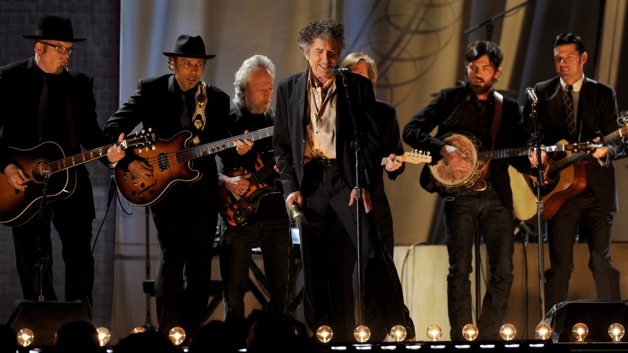 Bob Dylan (C) and The Avett Brothers perform onstage during The 53rd Annual GRAMMY Awards held at Staples Center on February 13, 2011 in Los Angeles, California.