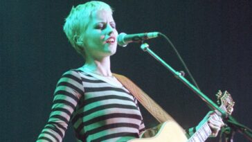 "Prior to that moment, I had always found the idea of kissing unpleasant, but experiencing my first real kiss changed my perspective: A look at how The Cranberries defied '90s norms to create a surprise hit that has experienced a resurgence."]