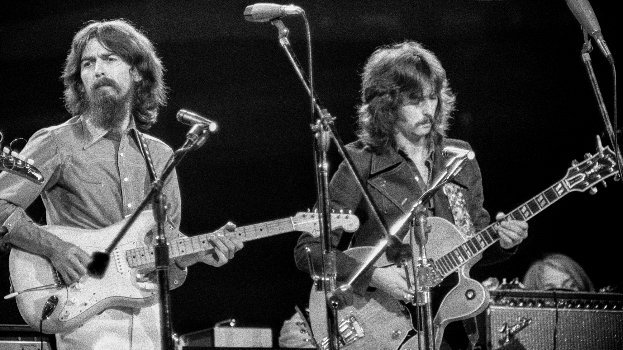 George Harrison and Eric Clapton performing at the Concert for Bangladesh at Madison Square Garden, August 1971