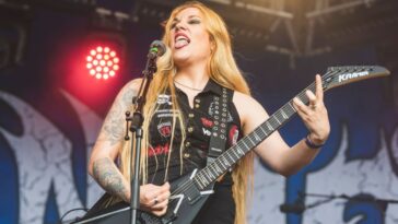 The metal guitar that Prika Amaral of Nervosa Trusts]