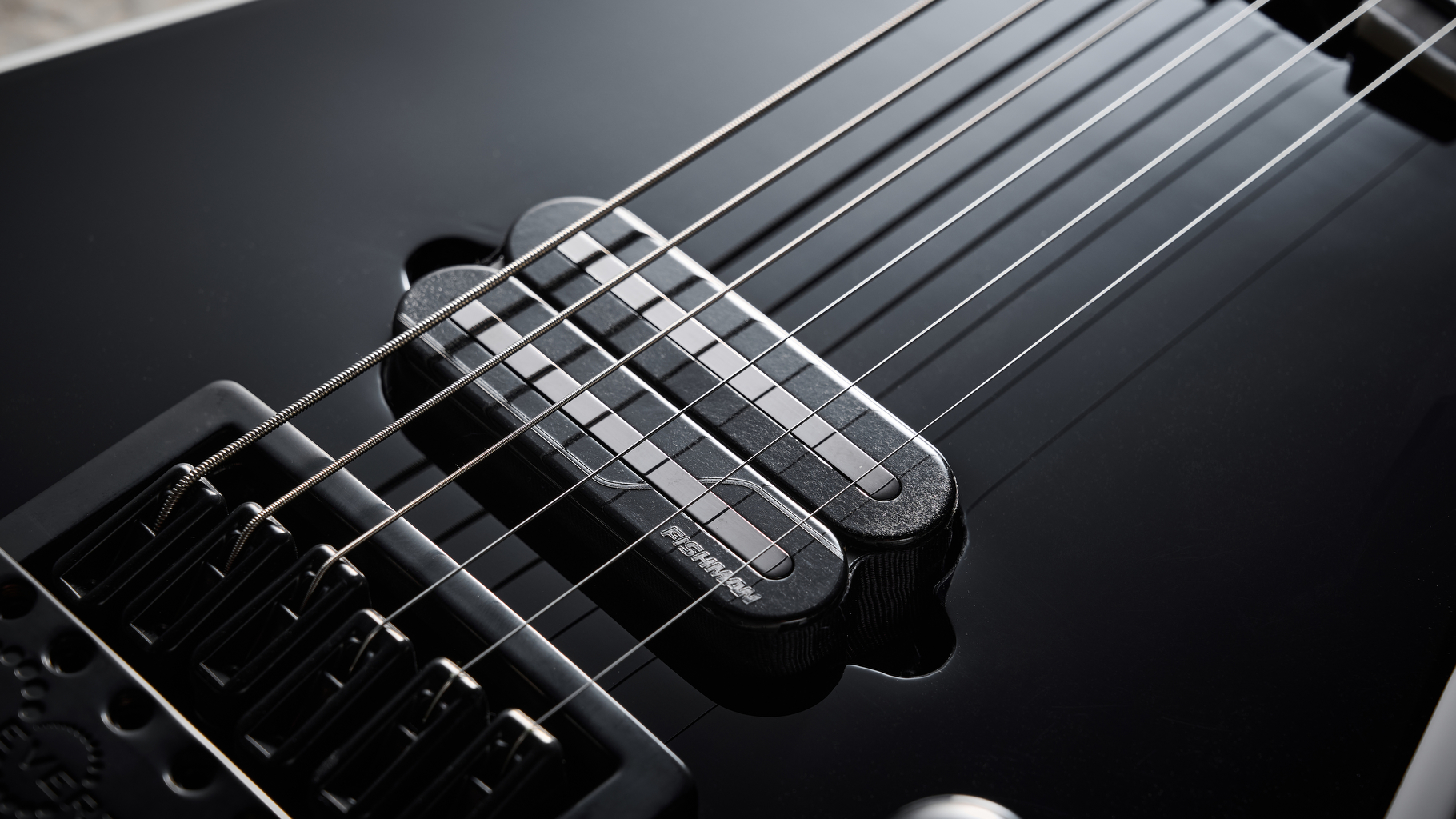 Close up of the Fishman humbucker on the Jackson Pro Plus Series Signature Christian Andreu Rhoads RR24 EVTN6 electric guitar