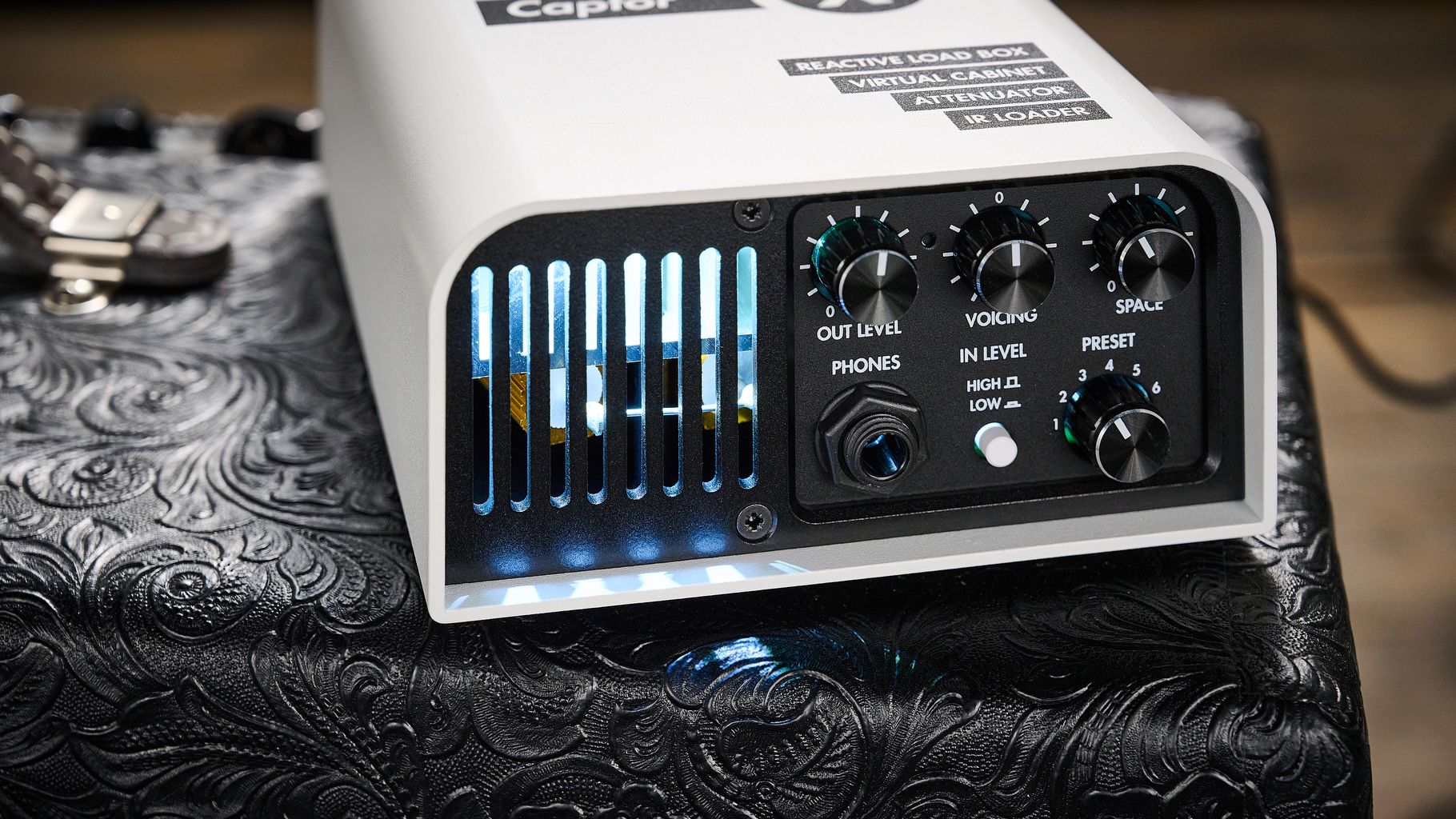 A Two Notes Torpedo Captor X Plus load box on top of a Fender tube amp