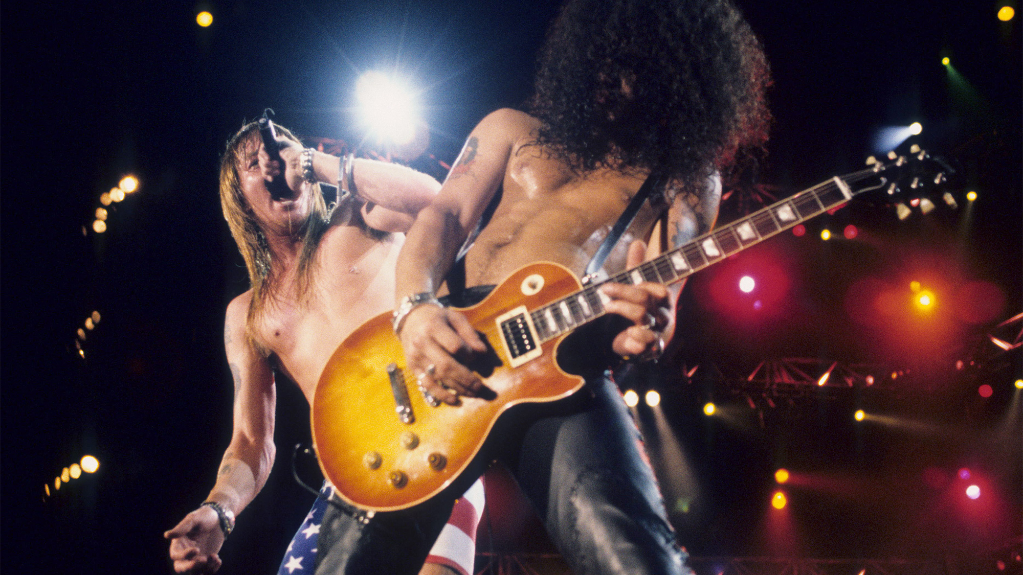 Axl Rose and Slash of Guns N Roses perform live at Rock In Rio II on January 15, 1991 in Rio De Janeiro, Brazil.